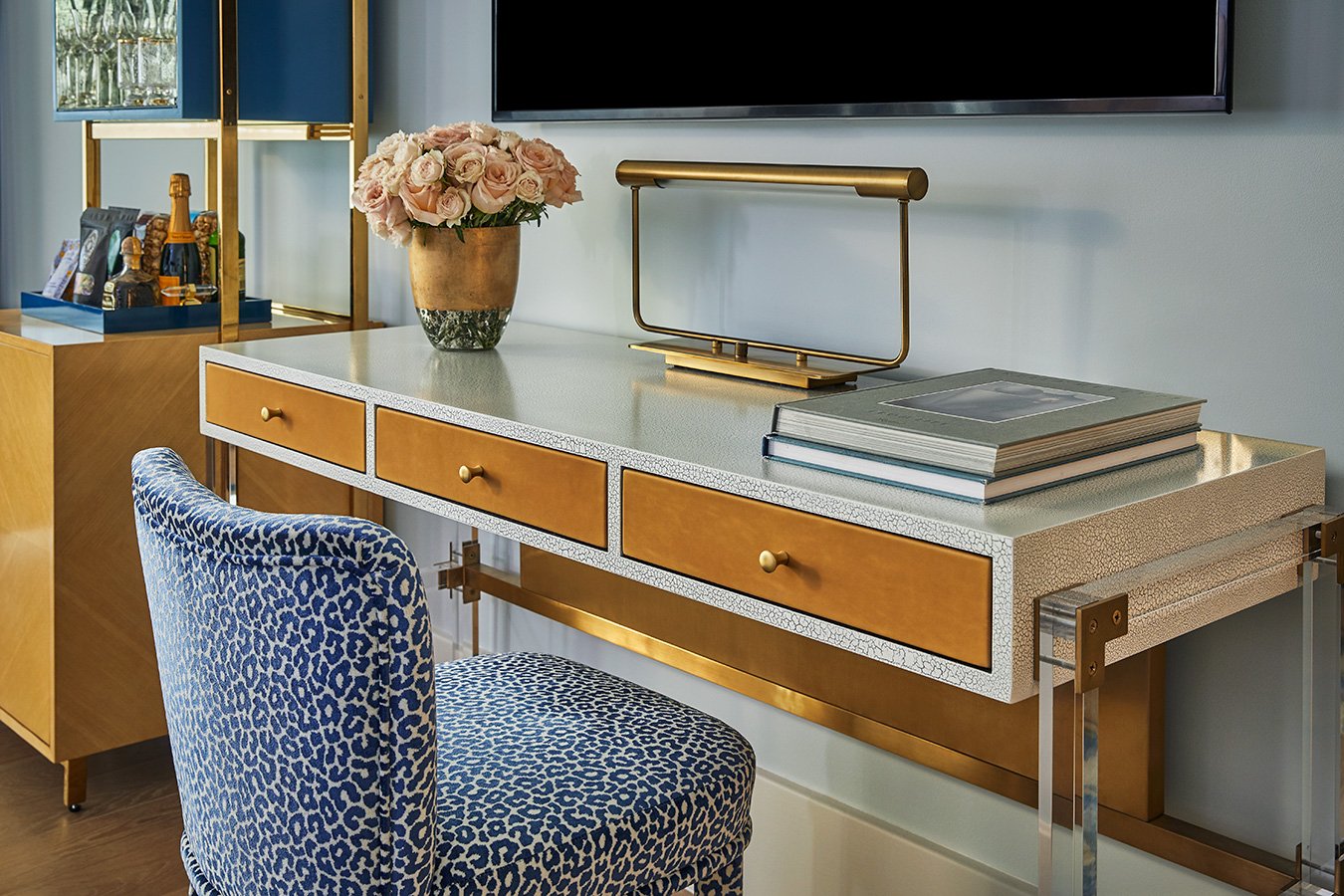 Close up of a working desk area in a room at The Sun Rose