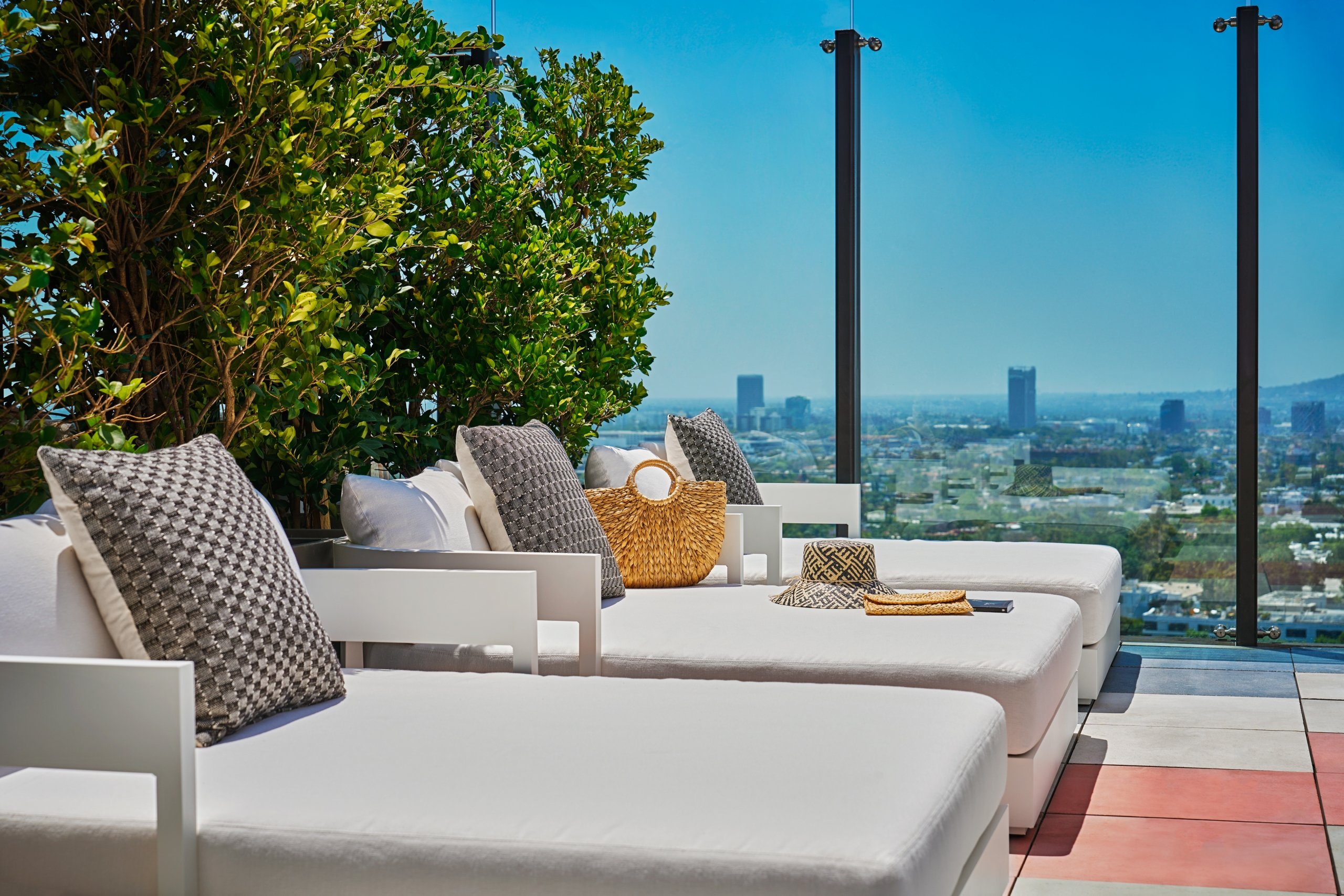 Out door lounging chairs with views of West Hollywood in the background