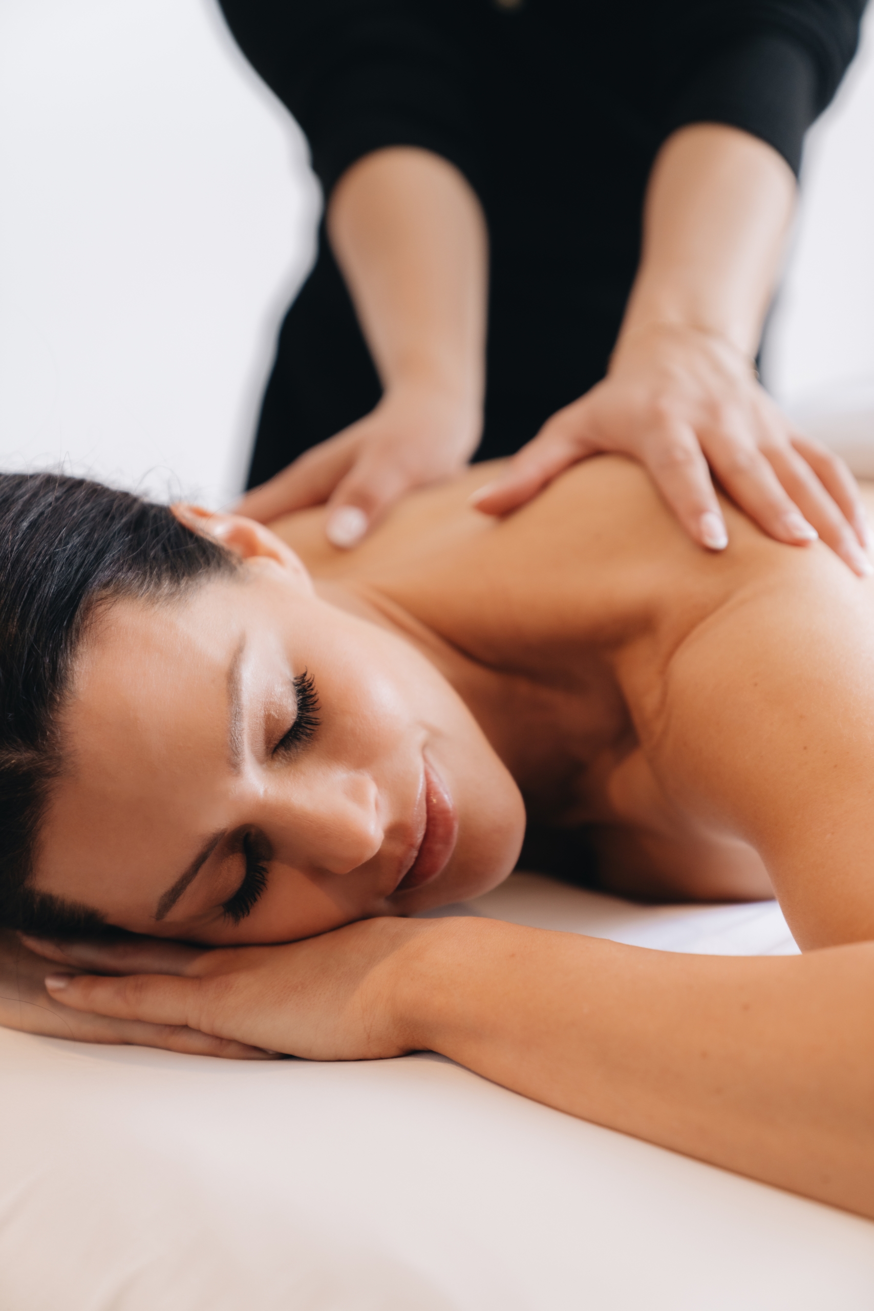 A woman getting a massage at The Sun Rose