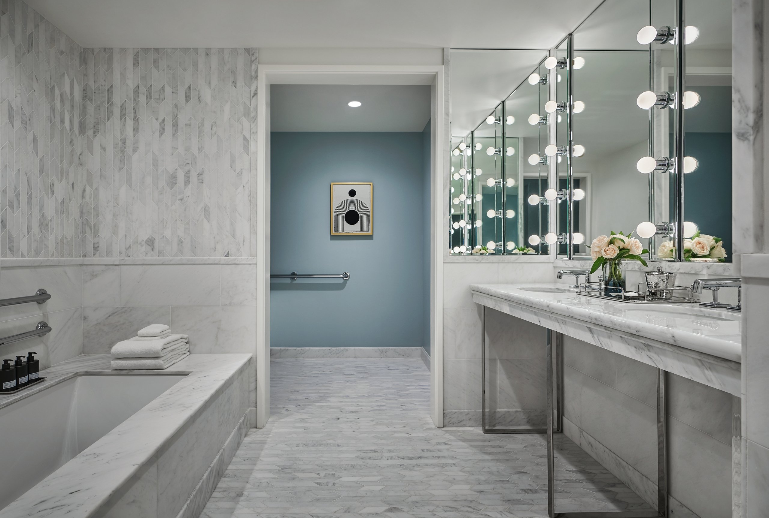 Modern bath and shower amenities at the Sun Rose Hotel in West Hollywood