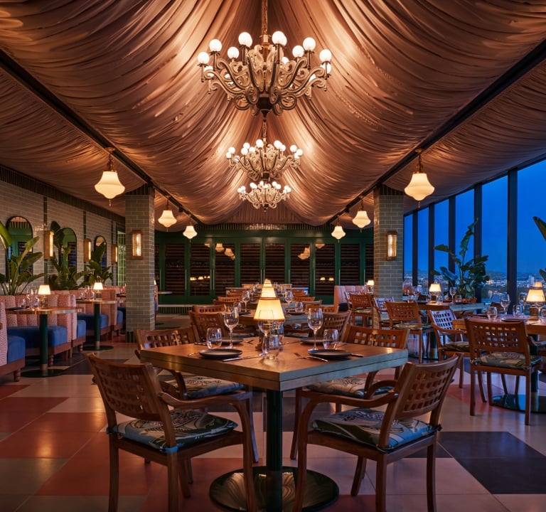Large indoor dining area prepared for late night service at The Sun Rose
