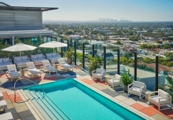 Over head view off The Pool at The Sun Rose and incredible views of West Hollywood in the background