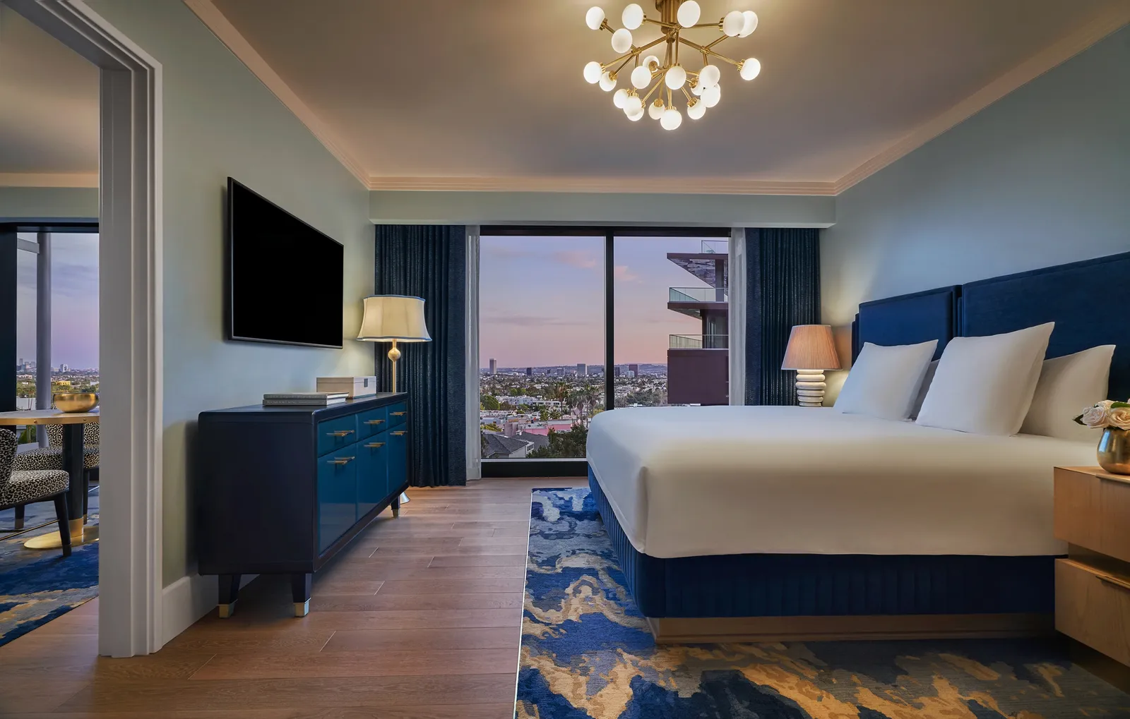 The Sun Rose West Hollywood one bedroom suite showing the Los Angeles Skyline at sunset.