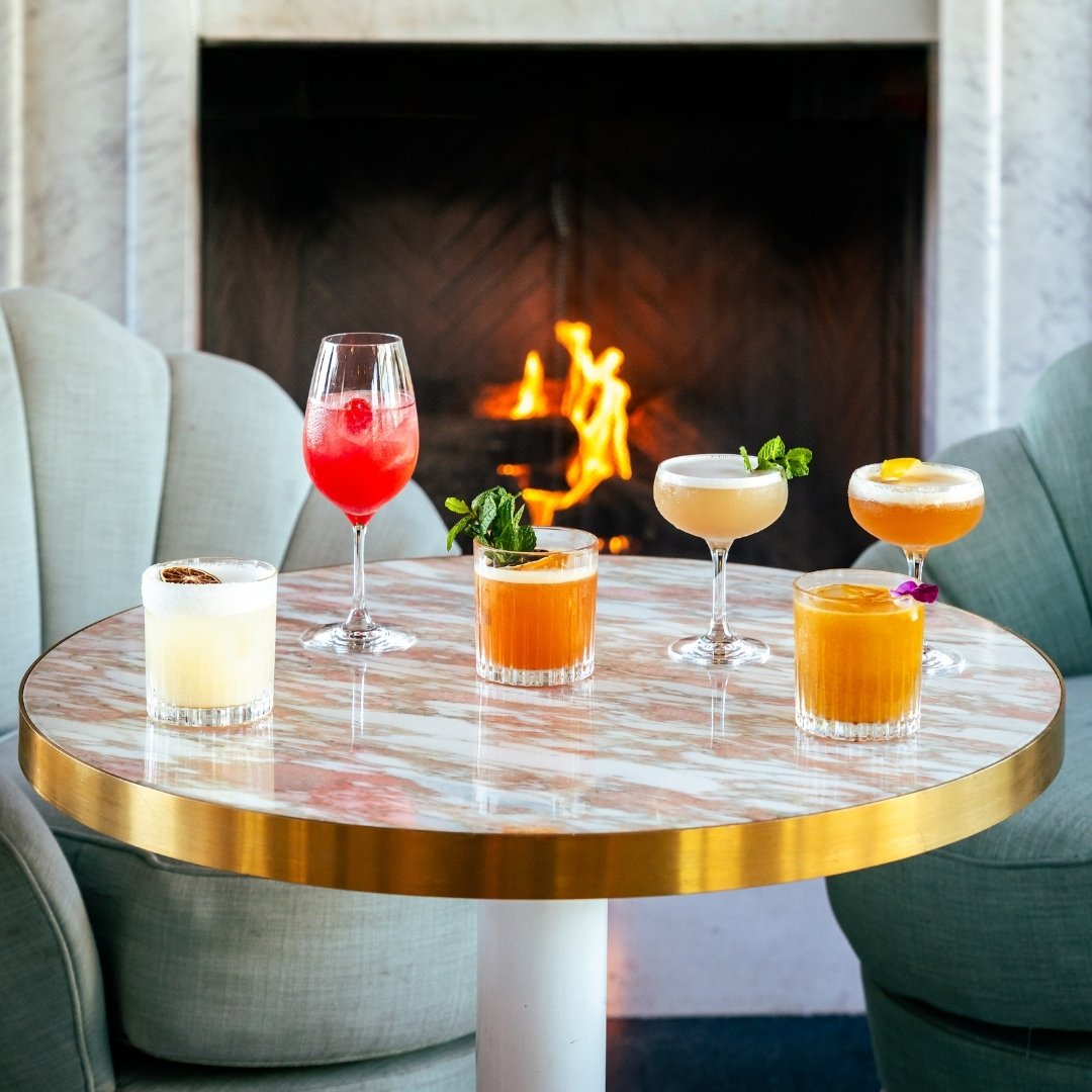 A set of six different types of holiday cocktails on a table