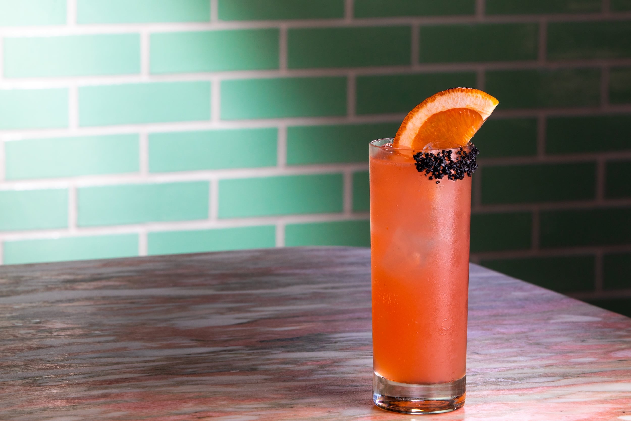 A glass of Rosa Del Mar cocktail.